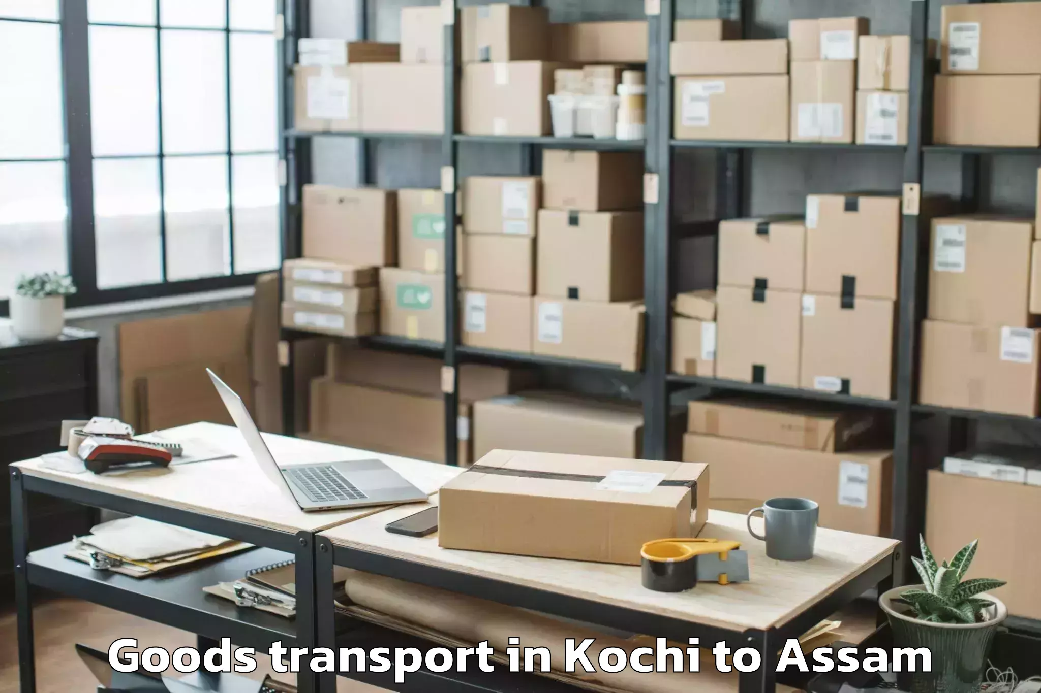 Top Kochi to Sonari Goods Transport Available